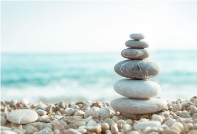 Balanced stones beside the sea