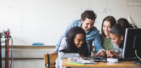 A team exploring a practical project together
